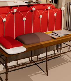 Détail du banc devant le lit